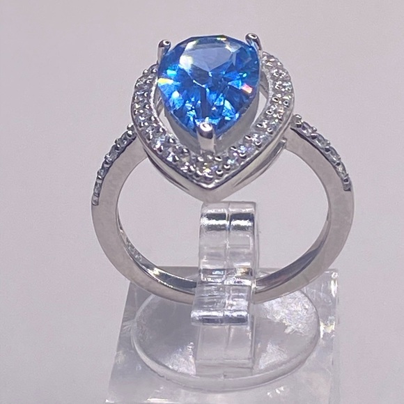 BLUE TOPAZ SIMULATED STONES AROUND CENTER -SET IN STERLING SILVER (7) - Picture 5 of 7